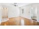 Living room featuring hardwood floors, white walls, and natural light at 311 Cortland Ave, Winter Park, FL 32789