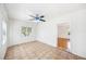 Spacious living room with wood floors, white walls and ample natural light at 311 Cortland Ave, Winter Park, FL 32789
