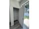 Walk-in pantry with ample shelving for organized storage at 320 W Necho Ave, Lake Alfred, FL 33850