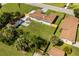An aerial view features a home with a big backyard, new fence and detached shed at 338 Henry Butts Dr, Daytona Beach, FL 32114