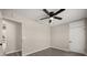 Vacant bedroom with modern ceiling fan, neutral paint and gray flooring at 338 Henry Butts Dr, Daytona Beach, FL 32114