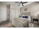 Spacious bedroom features ample closet space, a ceiling fan, and neutral decor at 338 Henry Butts Dr, Daytona Beach, FL 32114