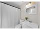 This cozy bathroom features a toilet and single sink at 3430 Arbutus Ln, Winter Park, FL 32792