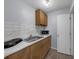 This cozy kitchen includes a countertop and a microwave at 3430 Arbutus Ln, Winter Park, FL 32792