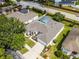 Aerial view of property showing roof, lawn, and pool at 3711 Half Moon Dr, Orlando, FL 32812