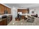Open kitchen with stainless steel appliances, granite countertops, cabinets and an island at 3711 Half Moon Dr, Orlando, FL 32812