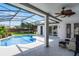 The lanai offers a comfortable outdoor living space with a pool view at 3711 Half Moon Dr, Orlando, FL 32812