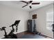 A home workout room with a stationary bike, free weights and a safe for valuables at 3711 Half Moon Dr, Orlando, FL 32812