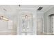 Welcoming foyer with bright white walls, tiled floor and chandelier at 3816 Eagle Isle Cir, Kissimmee, FL 34746