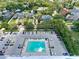This aerial view showcases a luxurious community pool and ample parking, offering convenience and leisure at 400 E Colonial Dr # 1501, Orlando, FL 32803