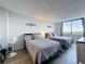Bedroom with two queen beds and views to the city skyline, creating a relaxing space at 400 E Colonial Dr # 1501, Orlando, FL 32803