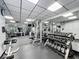 Modern gym with a full range of weightlifting equipment and ample space for a complete workout at 400 E Colonial Dr # 1501, Orlando, FL 32803
