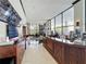 Welcoming lobby area with reception desk, tiled flooring, and large windows at 400 E Colonial Dr # 1501, Orlando, FL 32803