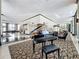 Spacious lobby featuring a grand piano, comfortable seating, and stylish carpeting at 400 E Colonial Dr # 1501, Orlando, FL 32803
