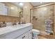Well-lit bathroom with walk-in shower and grab bars at 400 Timbercove Pl, Longwood, FL 32779