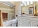 Bathroom featuring decorative tile, vanity and shower with sliding doors at 400 Timbercove Pl, Longwood, FL 32779