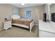 Cozy bedroom with neutral tones and ample natural light at 400 Timbercove Pl, Longwood, FL 32779