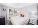 Light and airy bedroom with natural light and comfortable white bedding at 417 Monticello Dr, Altamonte Springs, FL 32701