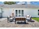 Outdoor seating with stylish furniture on a paved patio with string lights at 417 Monticello Dr, Altamonte Springs, FL 32701