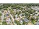 An aerial view of a community featuring mature trees, various styles of homes and well-maintained streets at 419 W Orange St, Altamonte Springs, FL 32714