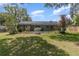 Beautiful backyard with a screened-in pool at 419 W Orange St, Altamonte Springs, FL 32714