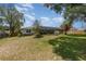 Well-maintained backyard with a screened-in pool area at 419 W Orange St, Altamonte Springs, FL 32714
