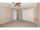 Neutral bedroom with white closets and tile flooring at 419 W Orange St, Altamonte Springs, FL 32714
