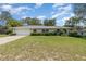 Cozy single-story home with a well-maintained lawn and attached two-car garage at 419 W Orange St, Altamonte Springs, FL 32714