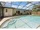 Pool view with steps to the water and home's exterior at 419 W Orange St, Altamonte Springs, FL 32714
