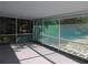 Enclosed lanai featuring screens and a concrete floor at 438 Romano Ave, Orlando, FL 32807