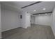 Spacious living area with modern flooring, recessed lighting and neutral color palette at 438 Romano Ave, Orlando, FL 32807