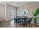 Cozy dining area featuring modern decor, stylish round table, and elegant wall accents at 5641 Brosnan Rd, St Cloud, FL 34771