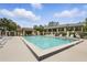 Inviting community pool area with ample seating, perfect for relaxation and social gatherings at 600 Northern Way # 607, Winter Springs, FL 32708