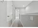 Hallway boasting neutral paint, carpet, and natural light at 600 Northern Way # 607, Winter Springs, FL 32708