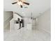 Open concept showcasing the kitchen with white cabinets, stainless appliances, and marble floors at 600 Northern Way # 607, Winter Springs, FL 32708
