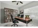 Home office featuring a stylish desk, shelving, and natural light at 600 Northern Way # 607, Winter Springs, FL 32708