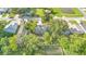 Aerial view of home with an extra large lot, showcasing lush backyard trees and surroundings at 706 19Th St, Orlando, FL 32805