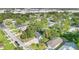 Aerial view of home in its neighborhood with lush trees, showing proximity to nearby highways at 706 19Th St, Orlando, FL 32805