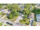 Aerial view of the neighborhood showcasing the property with lush landscaping and a brick driveway at 706 19Th St, Orlando, FL 32805