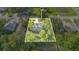 Aerial view outlining property lines highlighting the lot size and lush landscaping of this home at 706 19Th St, Orlando, FL 32805
