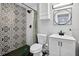 Bright bathroom featuring unique black and white patterned tile in the shower and modern fixtures at 706 19Th St, Orlando, FL 32805