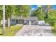 Charming home featuring a well-maintained front yard, a brick driveway and fresh paint at 706 19Th St, Orlando, FL 32805
