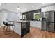 Modern kitchen with granite countertops and stainless steel appliances at 706 19Th St, Orlando, FL 32805