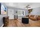 Bright living room features hardwood floors and stylish decor at 706 19Th St, Orlando, FL 32805