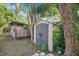Storage sheds in the backyard, perfect for tools, equipment, and outdoor gear at 706 19Th St, Orlando, FL 32805