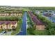 Charming townhomes line a street with lush trees and manicured lawns in a desirable neighborhood at 814 Calabria Ave, Davenport, FL 33897