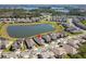 Community aerial view showing the community with water features and lush landscaping at 8935 Sonoma Coast Dr, Winter Garden, FL 34787