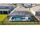 Aerial view of the backyard and pool area with black aluminum fencing at 8935 Sonoma Coast Dr, Winter Garden, FL 34787