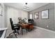 This spacious office features a large desk, accent wall and decorative lighting at 8935 Sonoma Coast Dr, Winter Garden, FL 34787
