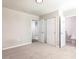 Bedroom with carpet flooring and multiple doors leading to other rooms at 1024 Desert Candle Dr, Ocoee, FL 34761